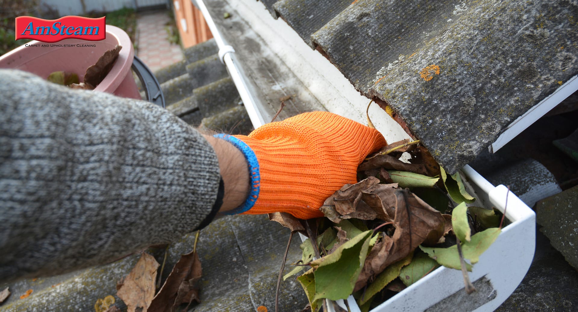 Cleaning out gutters to help prevent water damage to the home.